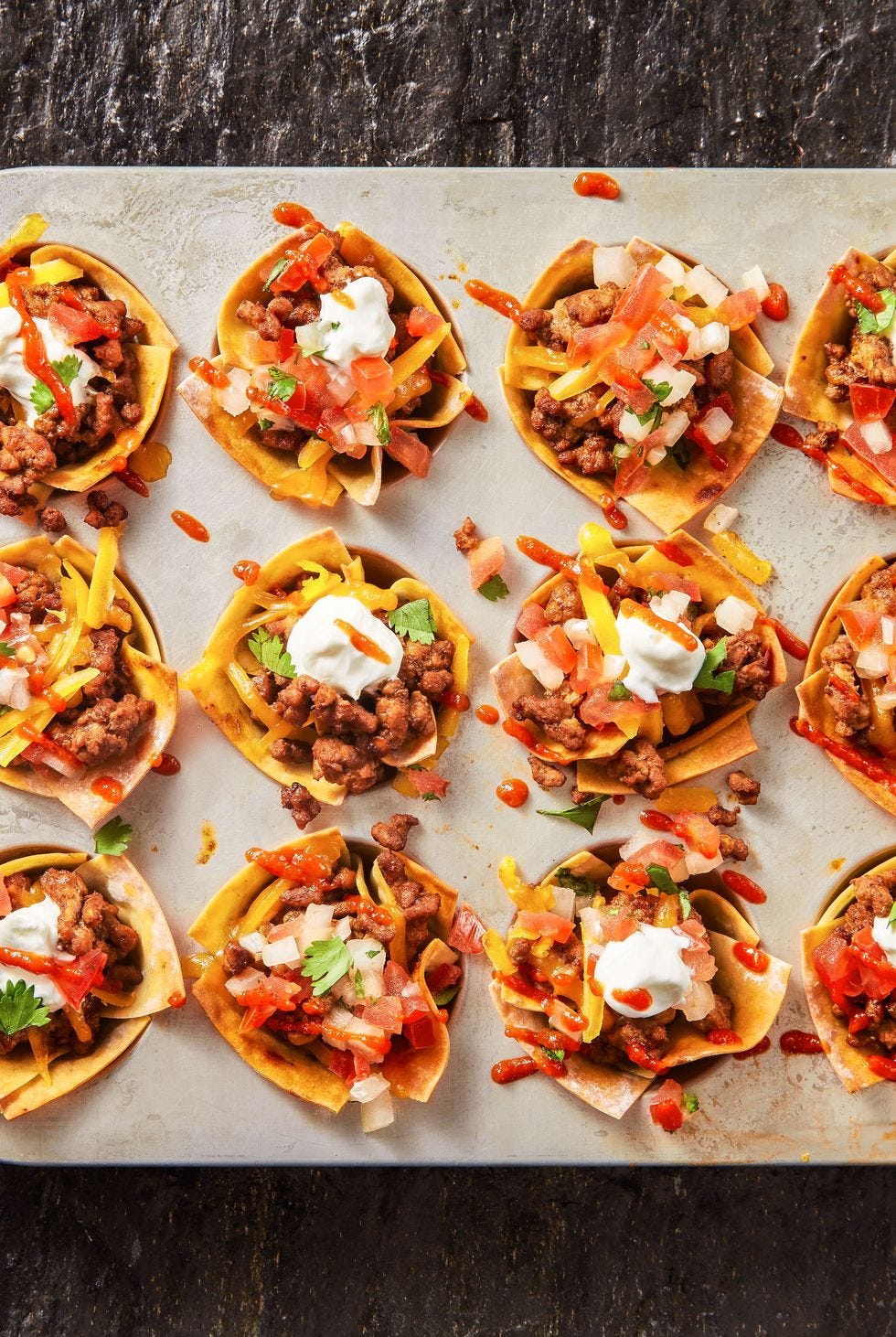 https://hips.hearstapps.com/hmg-prod/images/super-bowl-party-ideas-taco-cups-1642788851.jpeg?crop=0.9945578231292517xw:1xh;center,top&resize=980:*