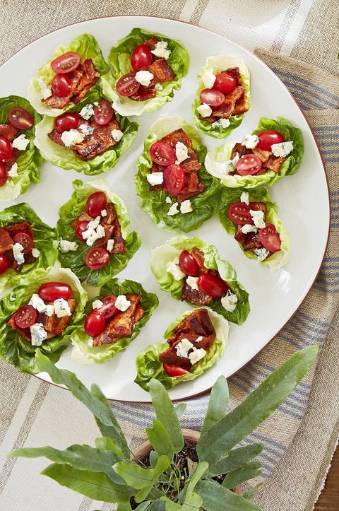 bacon lettuce cups arranged on a white plate