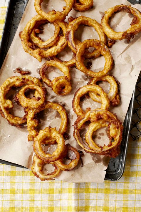 milk powder red onion rings on a parchment paper lined baking sheet