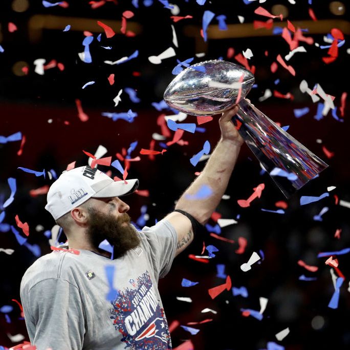 atlanta, georgia   february 03  julian edelman 11 of the new england patriots celebrates with the vince lombardi trophy after his teams 13 3 win over the los angeles rams during super bowl liii at mercedes benz stadium on february 03, 2019 in atlanta, georgia photo by al bellogetty images