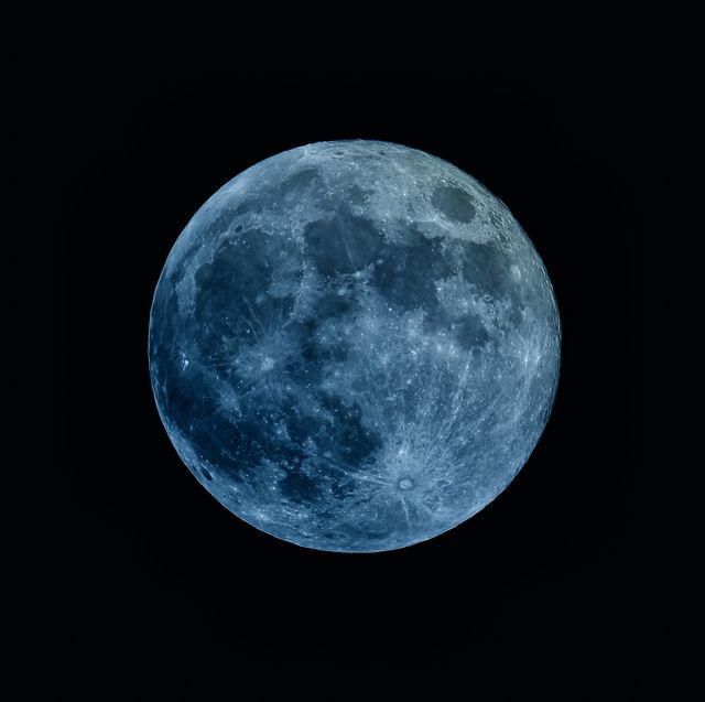 a moon that is tinted blue