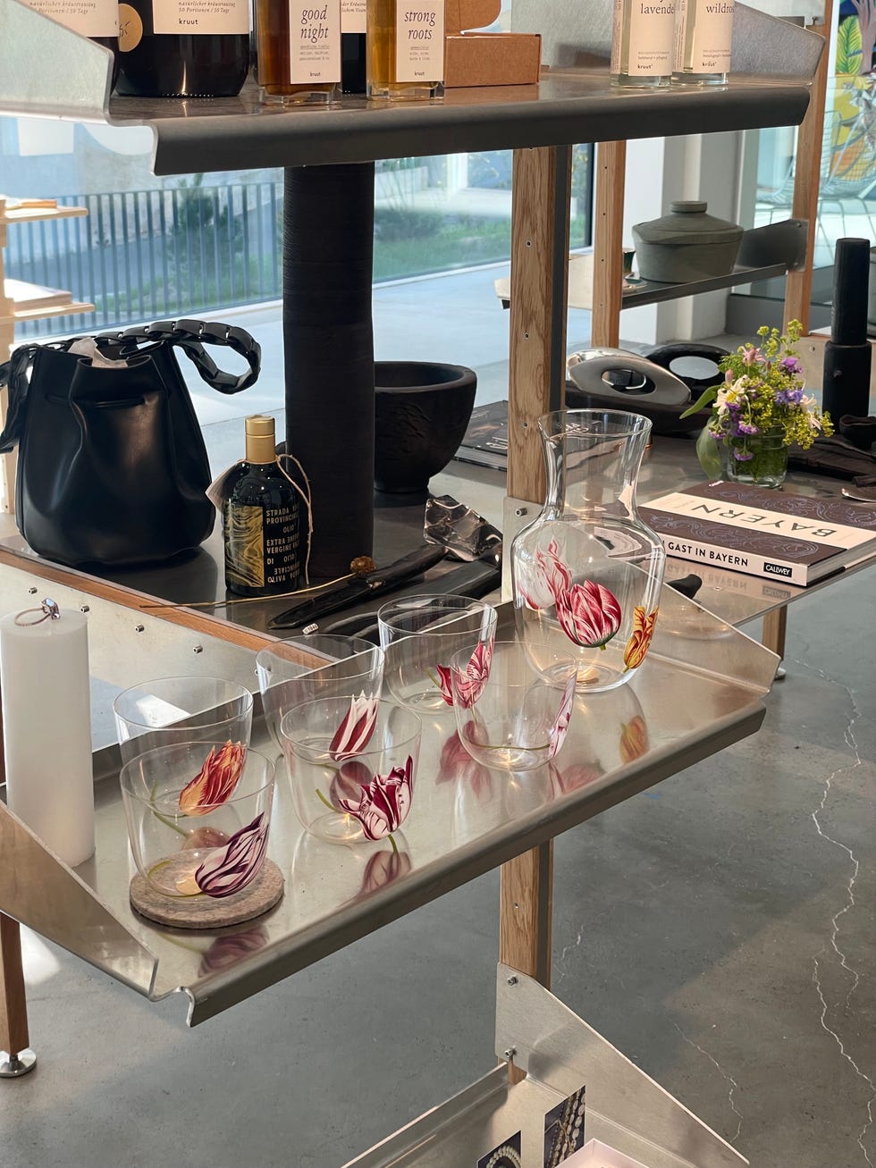 display of kitchenware and decorative items on a shelf