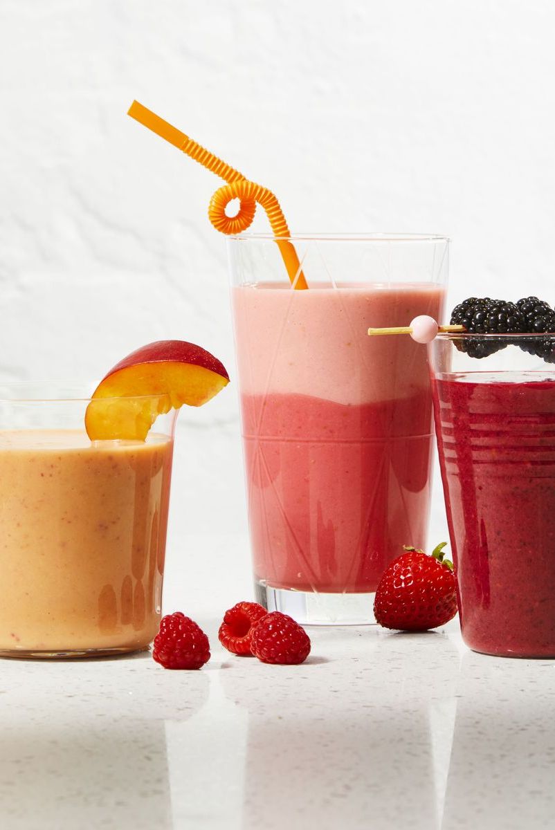 strawberry, raspberry and mango smoothes in glasses