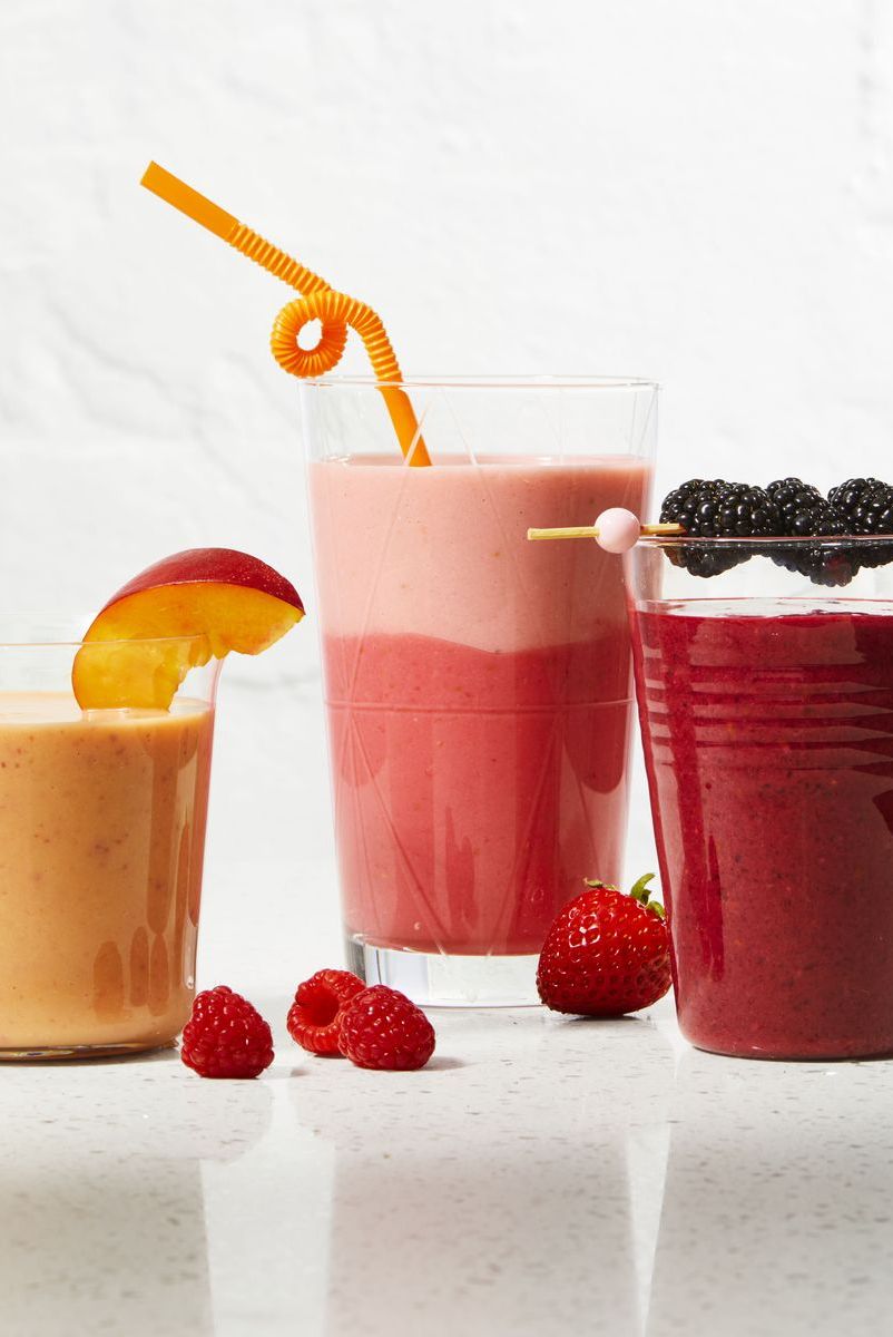 strawberry, raspberry and mango smoothes in glasses