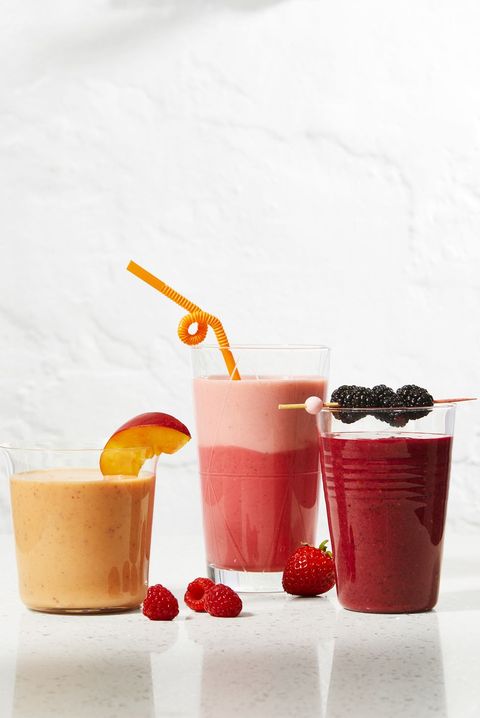 pink and yellow smoothies with fruit and yogurt