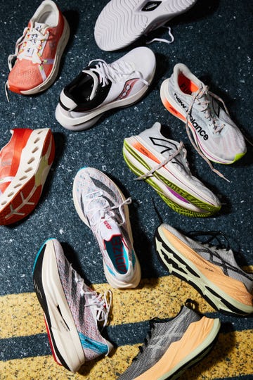 group of various shoes on pavement