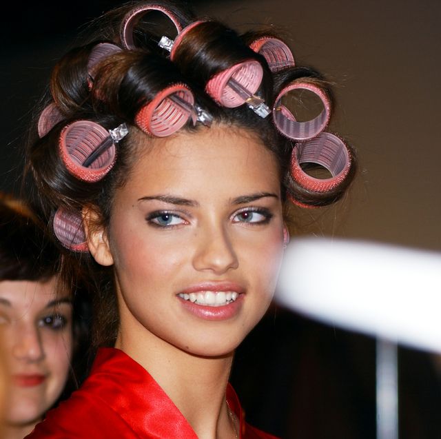 supermodel adriana lima with her hair in curlers backstage b