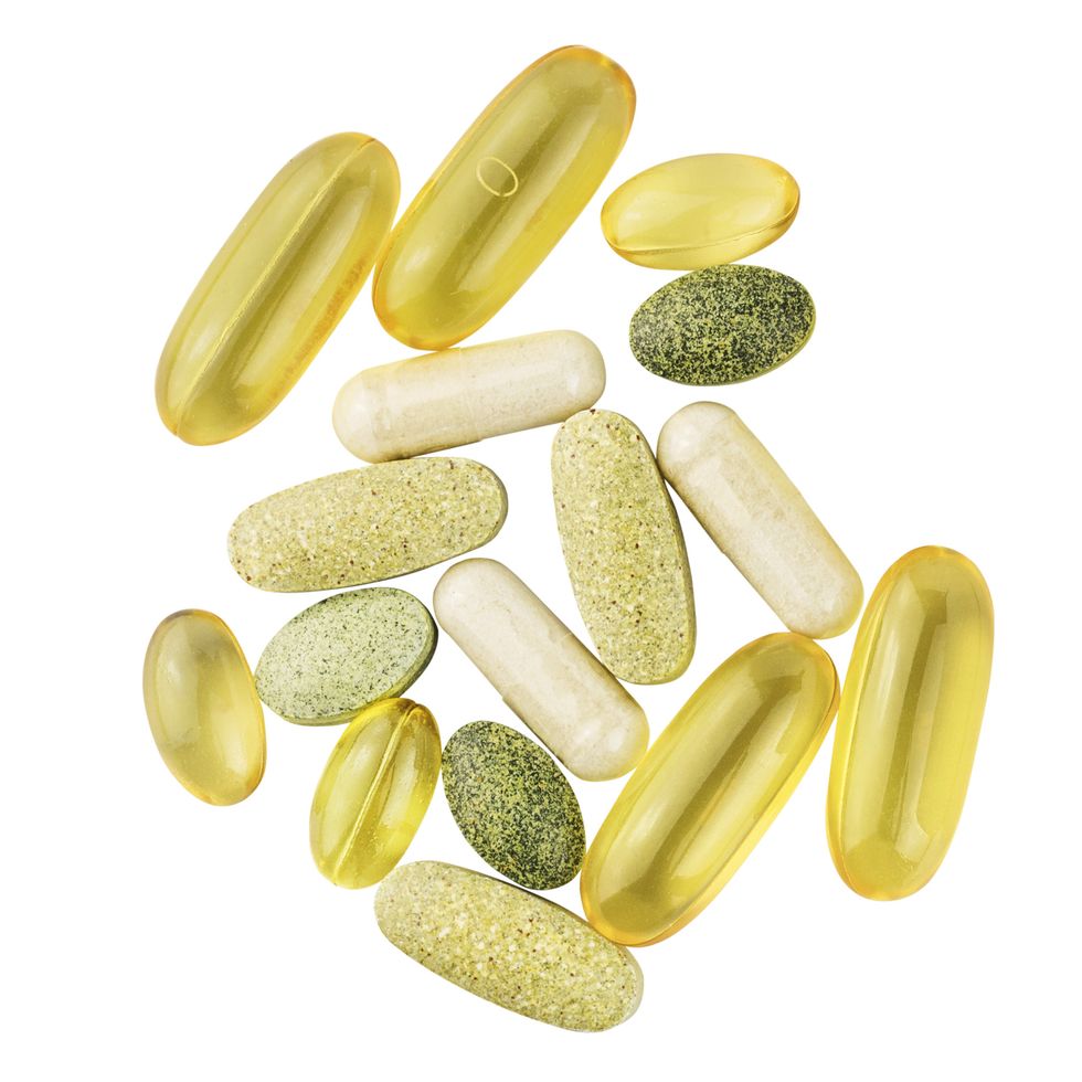 vitamin complex, omega 3, glucosamine capsules, multivitamin supplements isolated on white background, top view