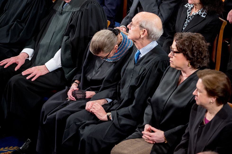 U.S. Supreme Court Justice Stephen Breyer keeps Justice Ruth Bader Ginsburg awake during the State of the Union Address