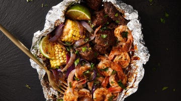 shrimp and steak grilled foil packs with corn and onion