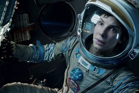 gravity, a good housekeeping pick for best survival movies, stars sandra bullock as a lone astronaut trying to get back to earth