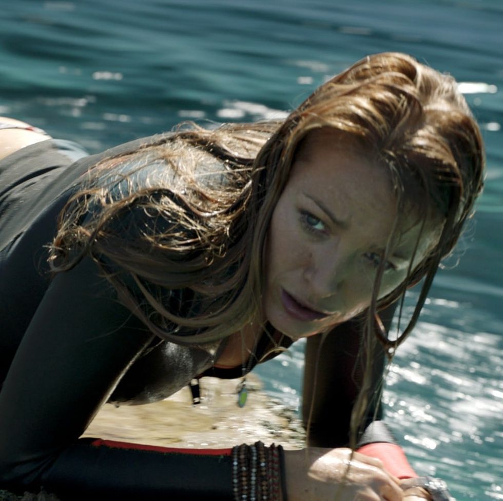 the shallows, a good housekeeping pick for best survival movies, stars blake lively as a surfer who has to survive a shark attack