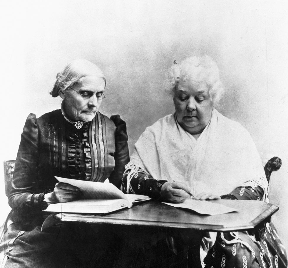 susan b anthony reading at a table with elizabeth cady stanton
