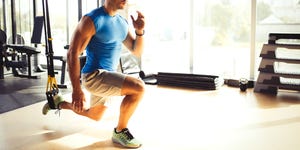 TRX suspension training- man doing leg exercises