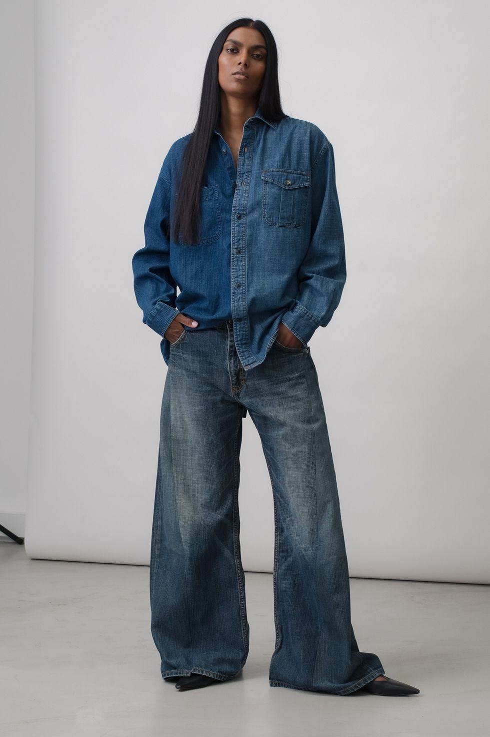 a man wearing a denim jacket a man wearing a denim jacket