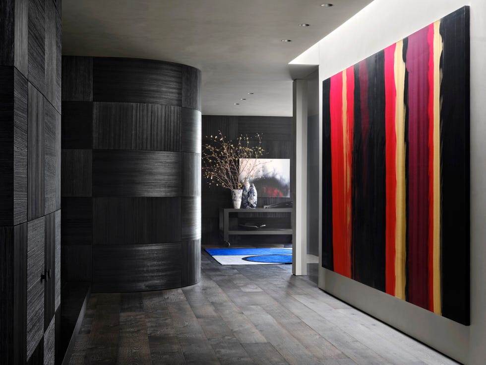 casa de campo contemporánea: recibidor con cuadro