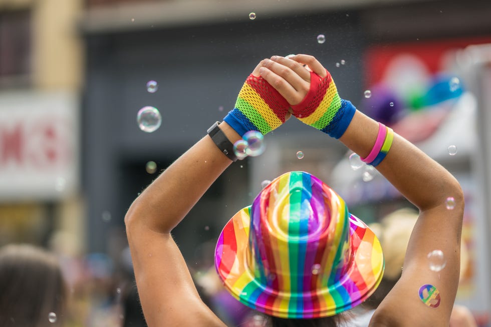 Young brunette woman promoting marriage equality.