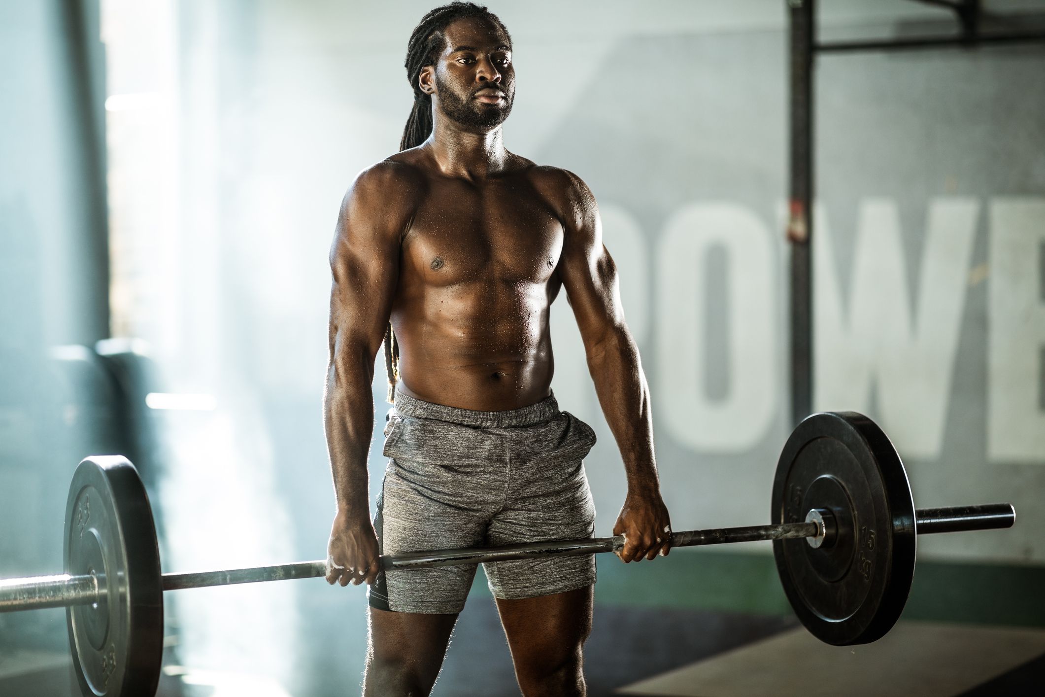 https://hips.hearstapps.com/hmg-prod/images/sweaty-african-american-athletic-man-exercising-royalty-free-image-1701099646.jpg