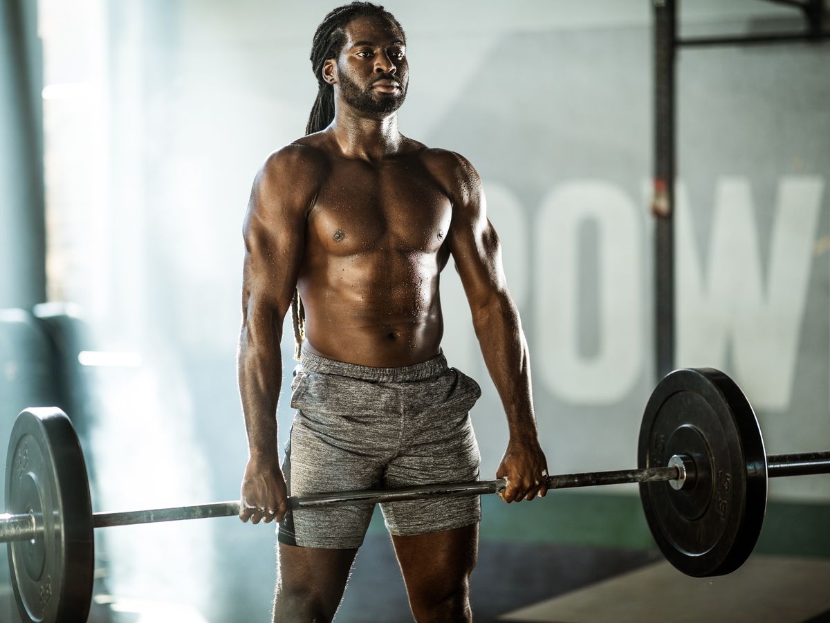 https://hips.hearstapps.com/hmg-prod/images/sweaty-african-american-athletic-man-exercising-royalty-free-image-1701099646.jpg?crop=0.88847xw:1xh;center,top&resize=1200:*