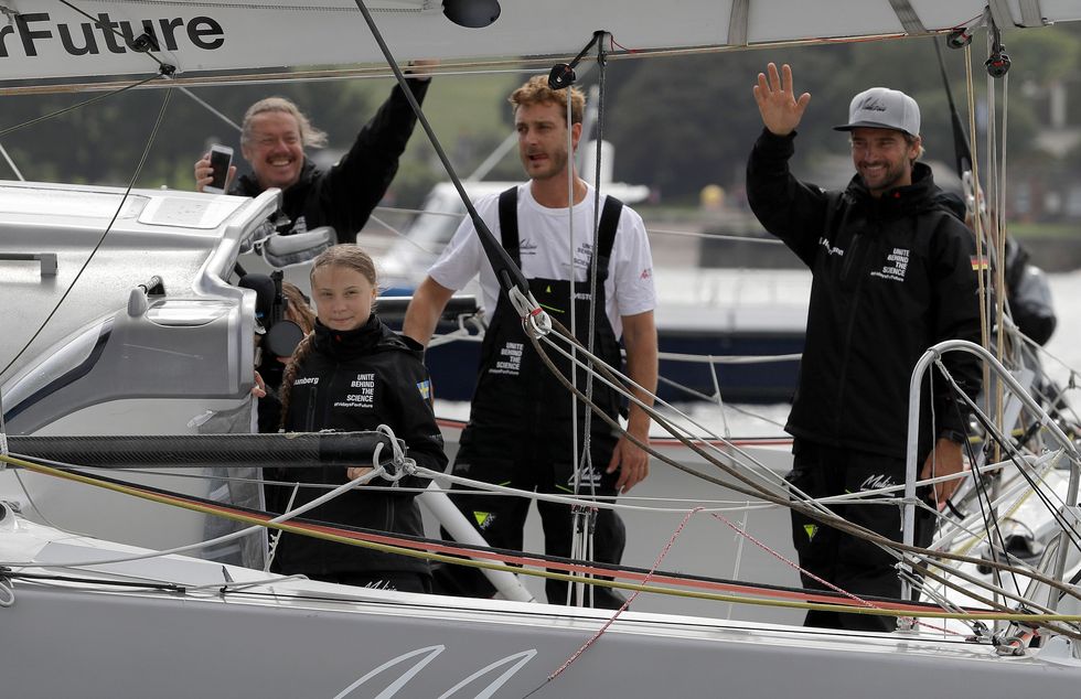 Greta Thunberg (center left) and Pierre Casiraghi (center right) aboard the carbon-neutral sailboat