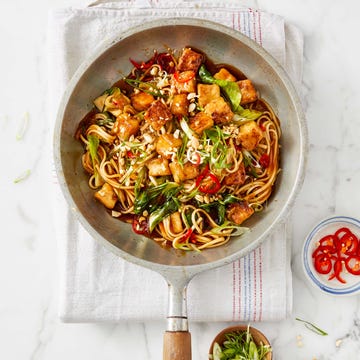 sweet and sticky tofu with baby bok choy recipe in a white pan