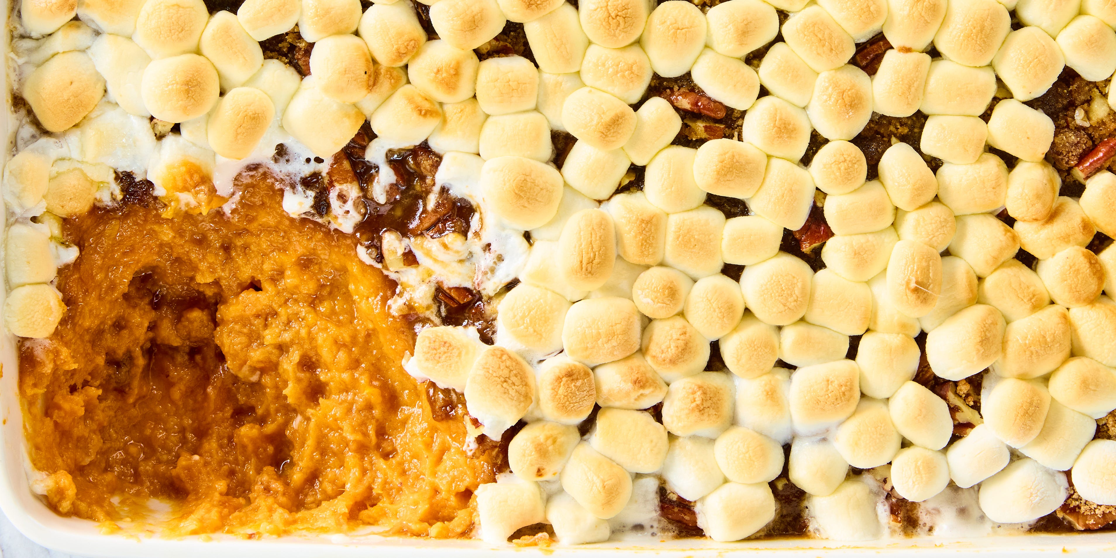 https://hips.hearstapps.com/hmg-prod/images/sweet-potato-casserole-marshmallows-index-654e4ef4b5383.jpg?crop=0.889xw:1.00xh;0.0224xw,0