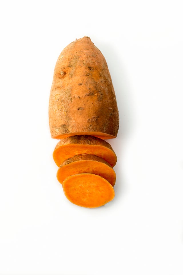 Sweet potato isolated on white studio background