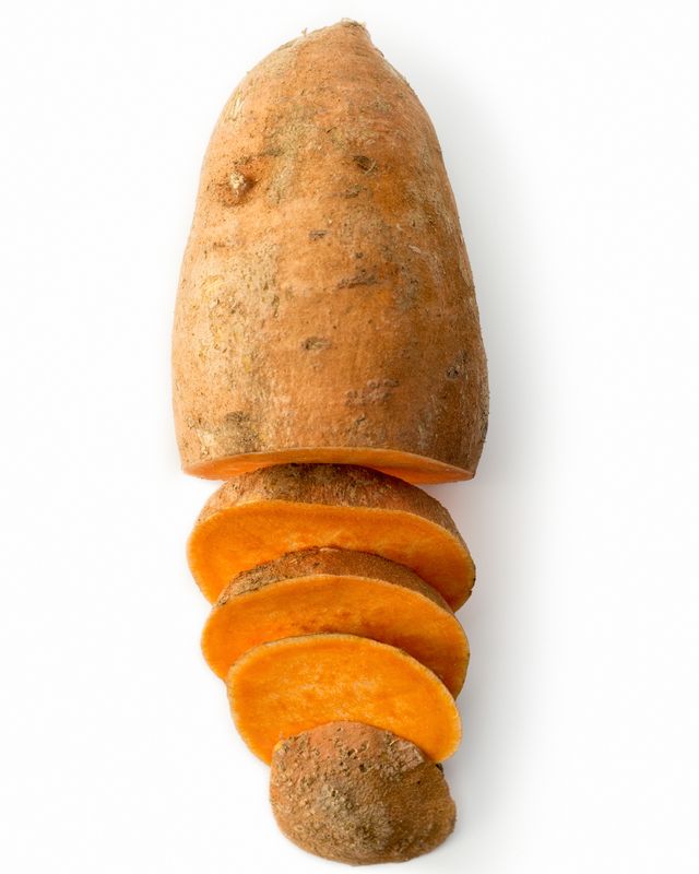 Sweet potato isolated on white studio background