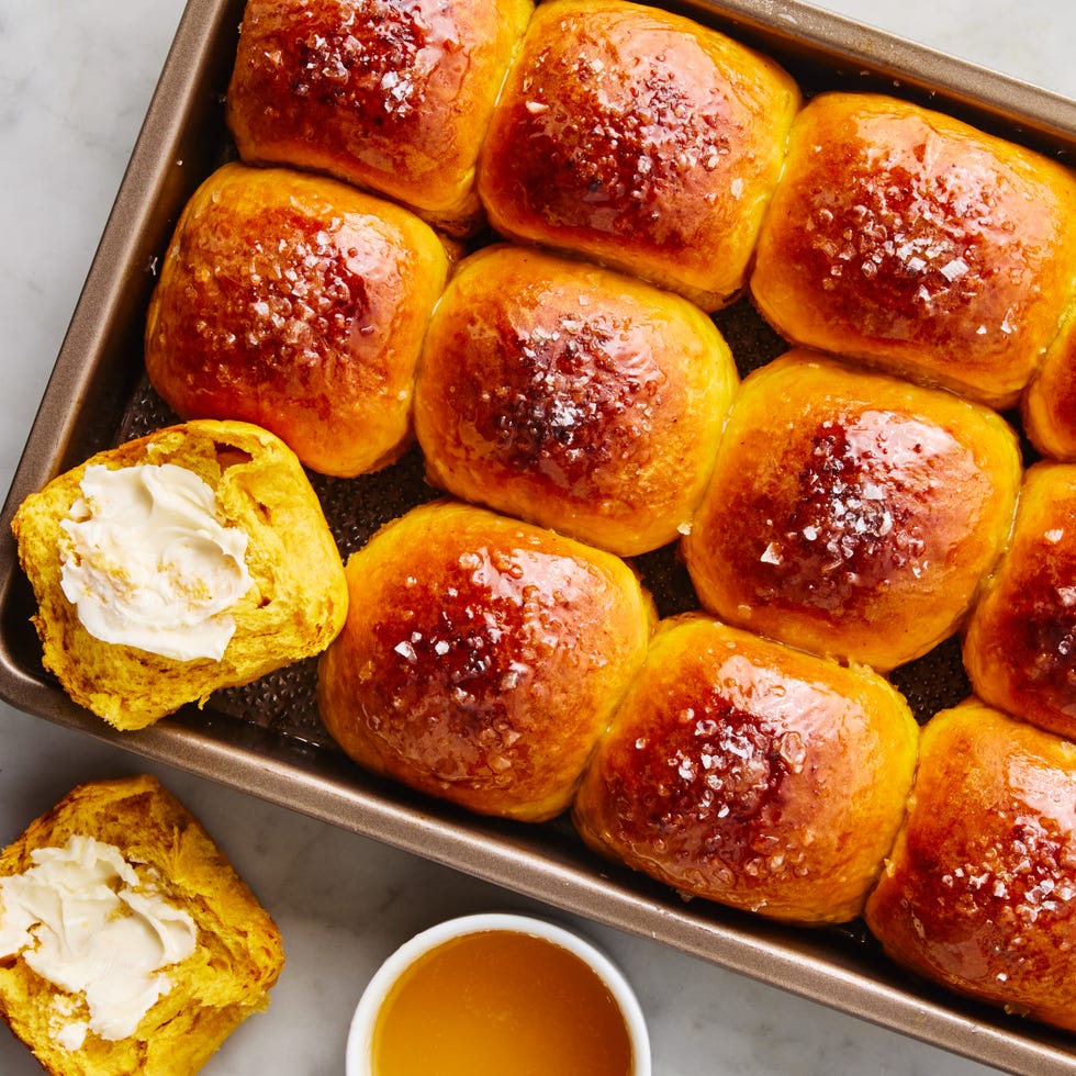 sweet potato dinner rolls brushed with butter