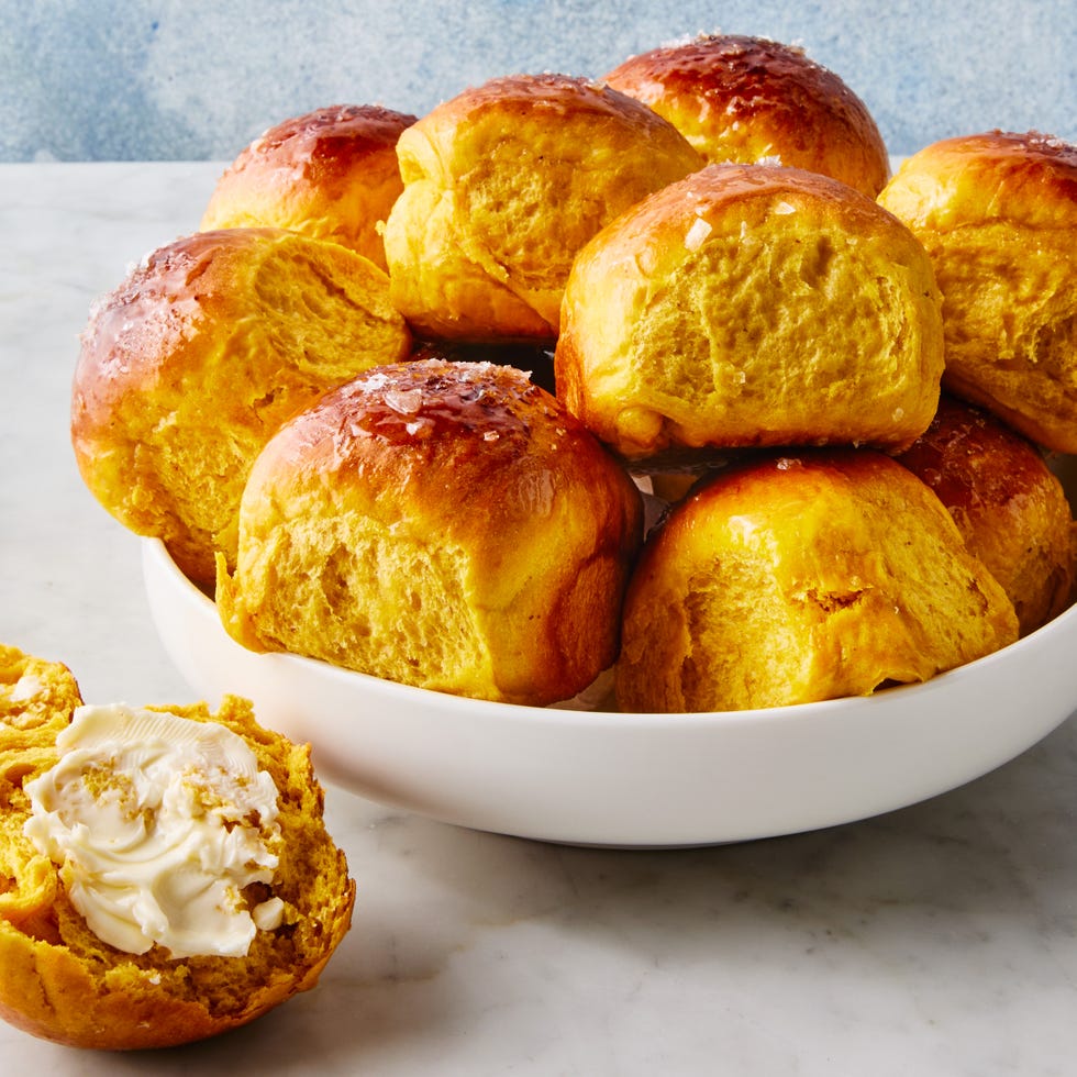sweet potato dinner rolls brushed with butter