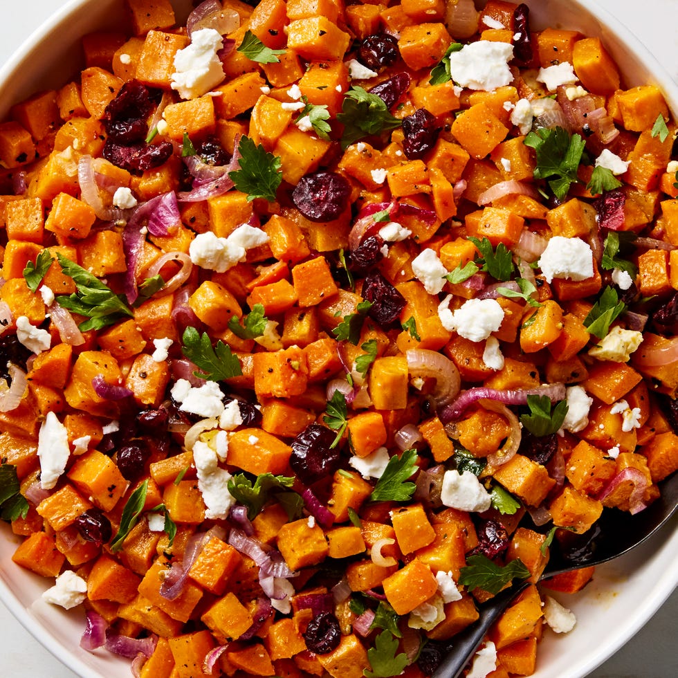 Cubed sweet potatoes with crumbled feta, red onion, dried cranberries and parsley