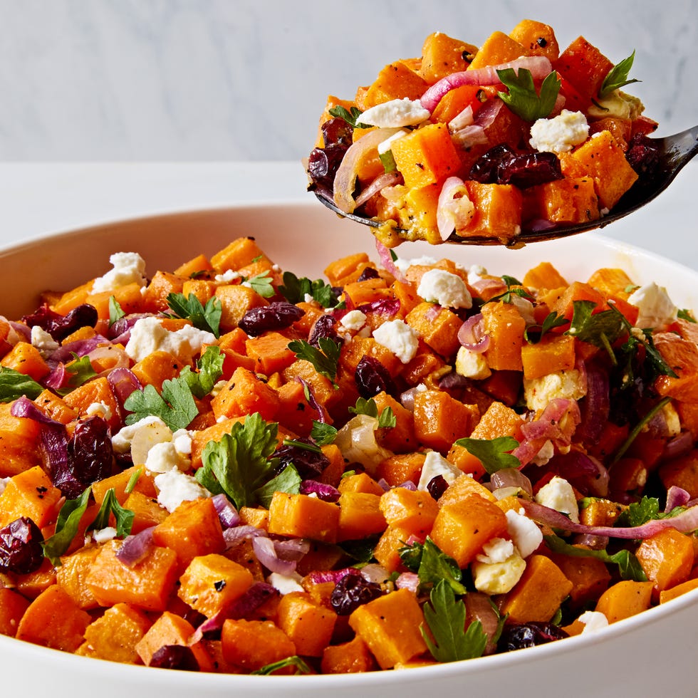 cubes of sweet potato with crumbled feta, red onion, dried cranberries, and parsley