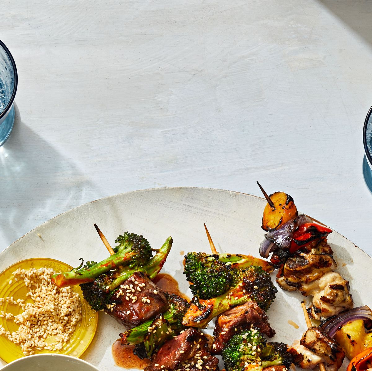 Gochujang minute steak skewers with charred broccolini and lime