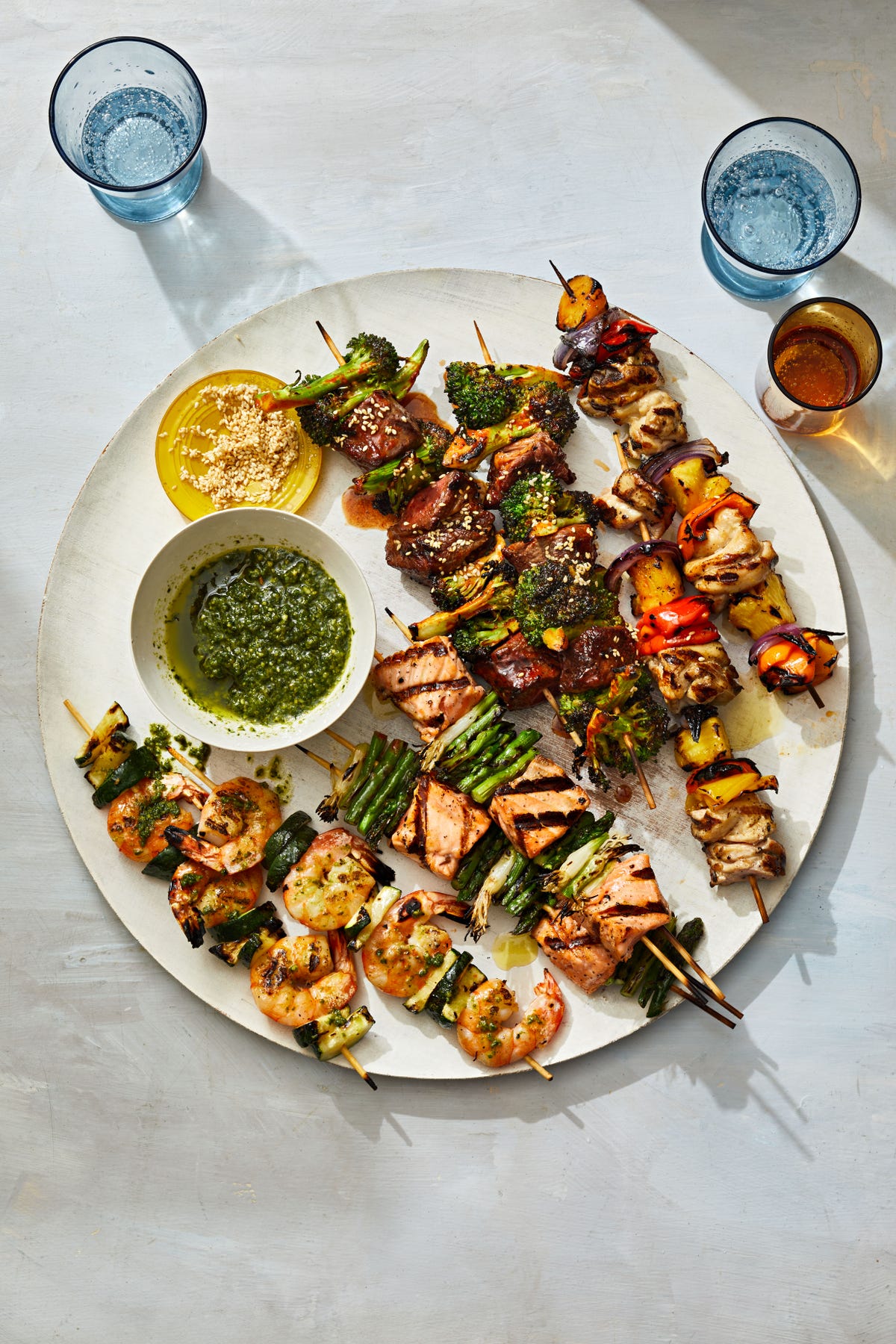 Gochujang minute steak skewers with charred broccolini and lime