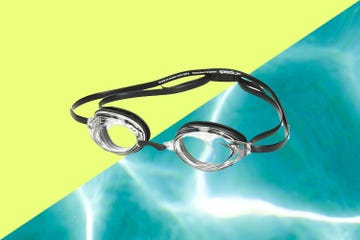 a pair of goggles on a blue surface