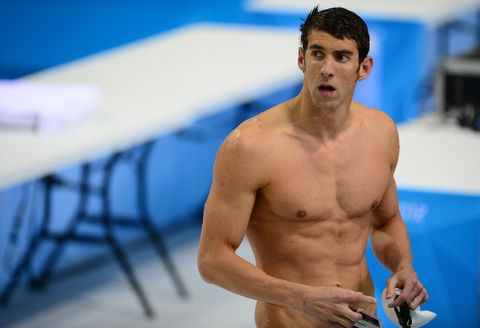US swimmer Michael Phelps reacts after c
