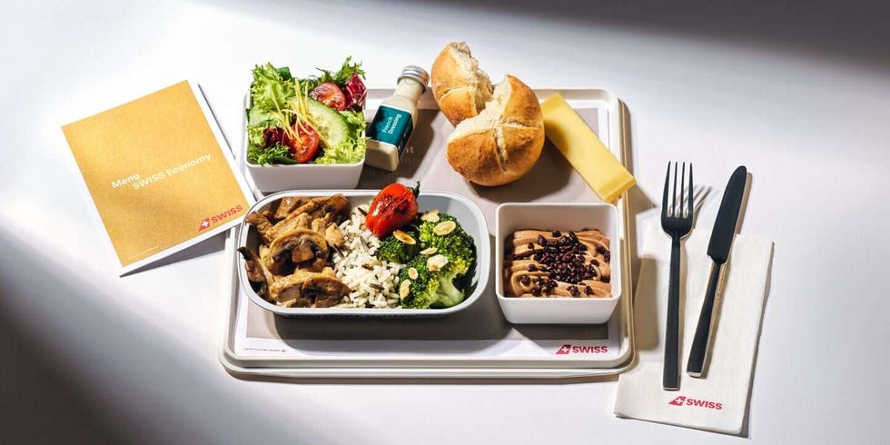 a tray with food and a fork