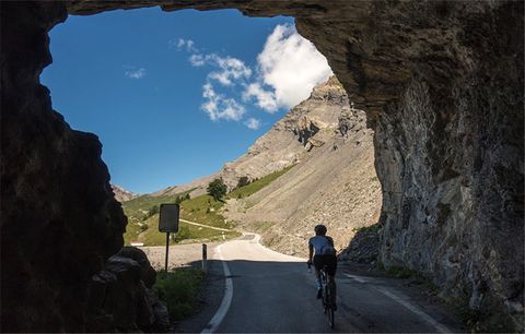 Road cycling through the Swiss Alps. 