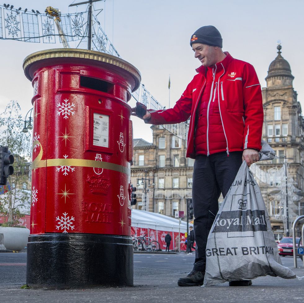 royal mail musical christmas post box on george square in glasgow
