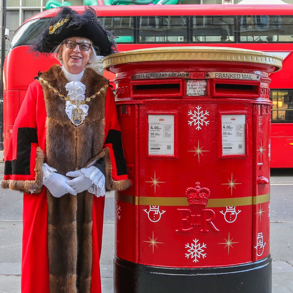 lord mayor of westminster patricia mcallister visits a christmas decorated royal mail postbox in oxford street, london on november 30 2023