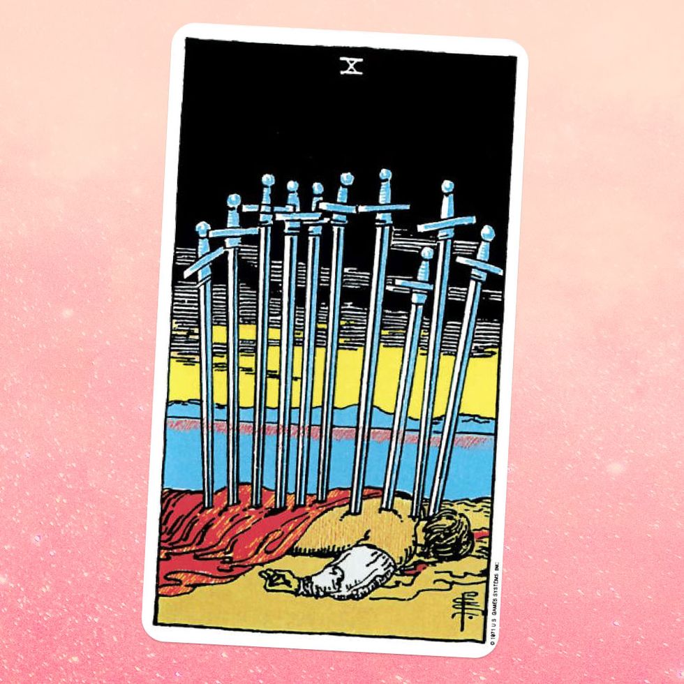 the tarot card the ten of swords, showing a person lying on the ground with ten swords in their back