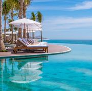 Swimming pool, Resort, Property, Azure, Aqua, Leisure, Vacation, Caribbean, Sunlounger, Sea, 