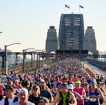 runners crossing the sydney harbour bridge during the sydney marathon