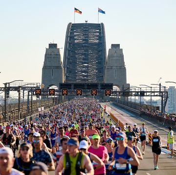 runners crossing the sydney harbour bridge during the sydney marathon