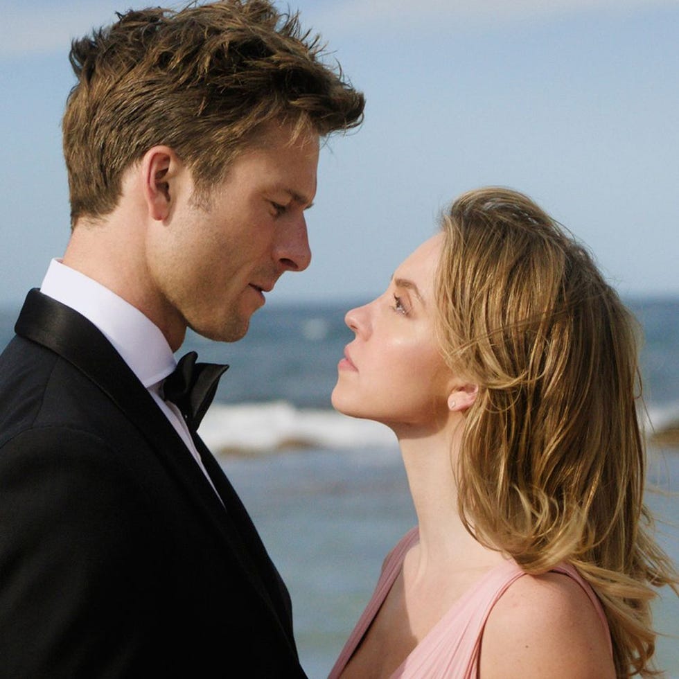 couple gazing into each others eyes at the beach