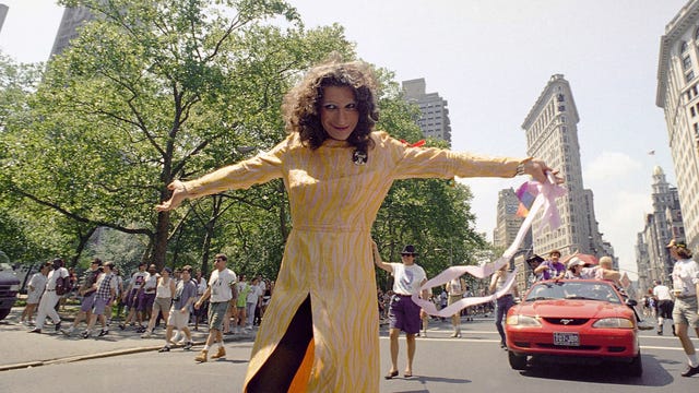 Stonewall veteran Sylvia Rivera leads the ACT-UP march past New York's Madison Square Park, June 26, 1994. The march was one of two held on Sunday to commemorate the 25th anniversary of the riot at the Stonewall Inn, a Greenwich Village bar that erupted in violence during a police raid in 1969. The incident is now considered the start of the gay rights movement. Virtually every reliable account credits Sylvia, a man who prefers the feminine pronoun, with a major role in the riot. (AP Photo/Justin Sutcliffe)