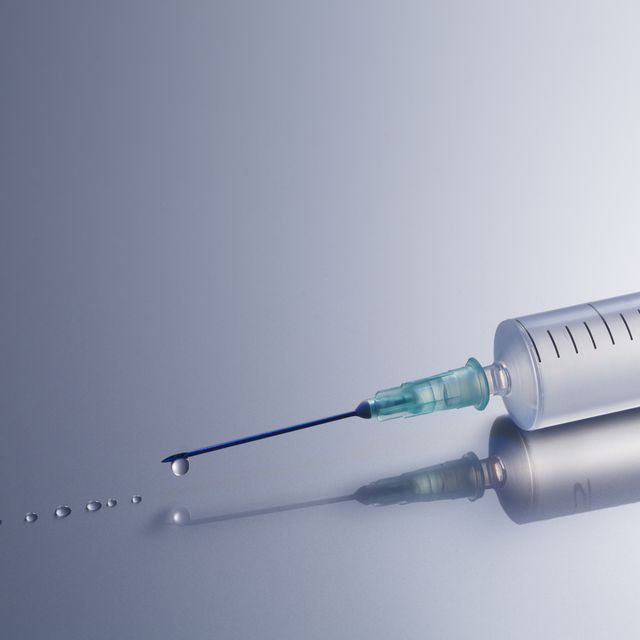 Syringe with water droplets