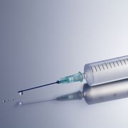 Syringe with water droplets