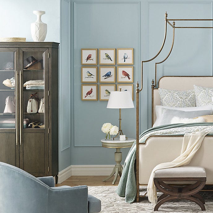 a bedroom with a bed and a chair a bedroom with a bed and a chair