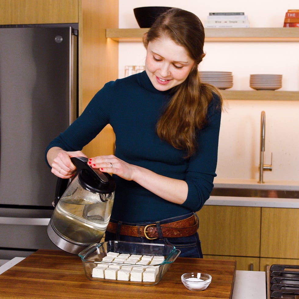 Taylor Ann preparing a meal